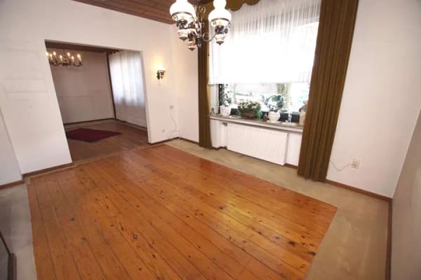 Immobilie in Oelde - Charmantes Zweifamilienhaus mit großzügigem Raumangebot und idyllischem Garten in Oelde! - Bild 1