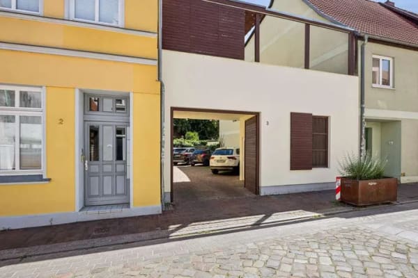 Immobilie in Güstrow - Wohn- und Geschäftshaus in der Schloßstraße in Güstrow – 4 Wohnungen + Gewerbeeinheit - Bild 3