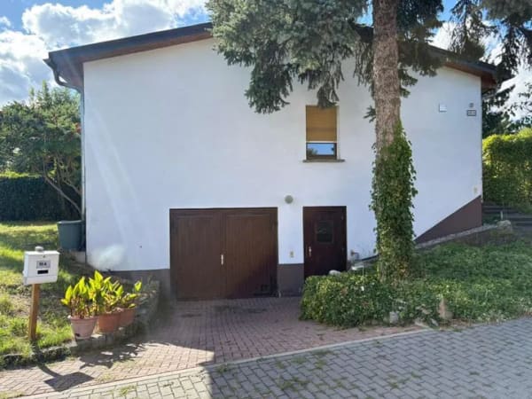 Immobilie in Naundorf - Gemütliches Einfamilienhaus mit idyllischem Garten und viel Gestaltungspotenzial in Naundorf - Bild 1