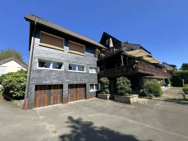 Immobilie in Halver - Gepflegtes Vierfamilienhaus mit 5 Garagen in ruhiger Lage von Halver - Schwenke. - Bild 3