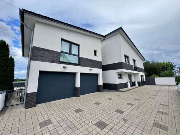 Immobilie in Rühen - Architektonisches Statement in Feldrandlage - Bild 1