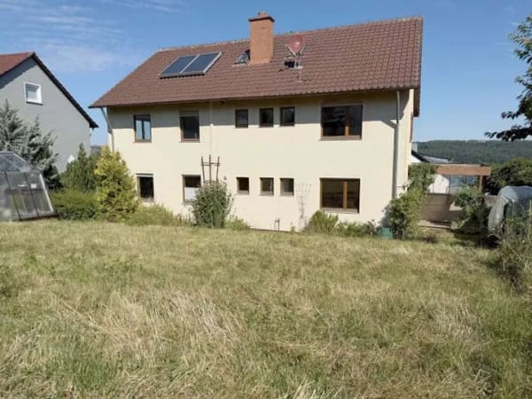 Immobilie in Neckartenzlingen - VIELSEITIGES 2-3 FAMILIENHAUS AUF GROßZÜGIGEM, SONNIGEM GRUNDSTÜCK IN NECKARTENZLINGEN - Bild 1