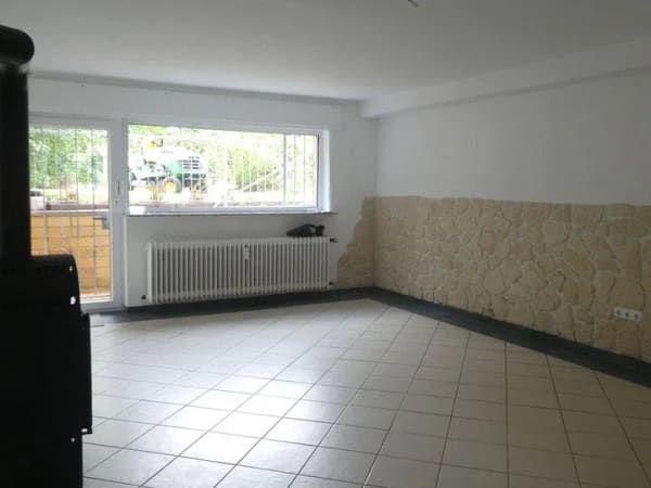 Immobilie in Reichelsheim - Viel Platz und naturnahes Wohnen: Souterrainwohnung mit Garten und Außenstellplatz! - Bild 1