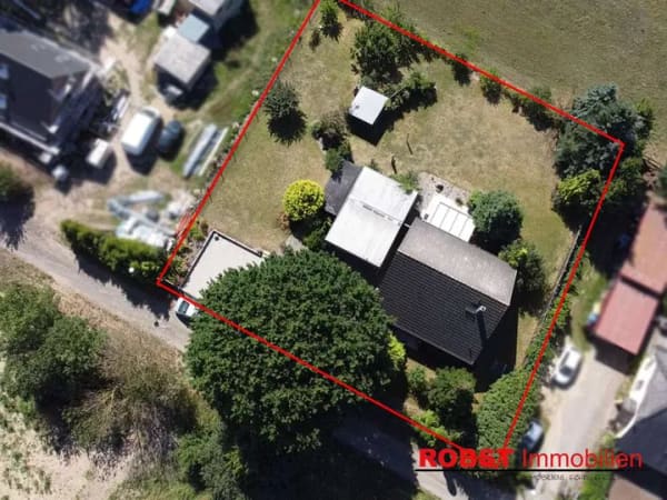 Immobilie in Dassow - Großzügiges Einfamilienhaus auf weitläufigem Grundstück mit Blick ins Grüne - Bild 1