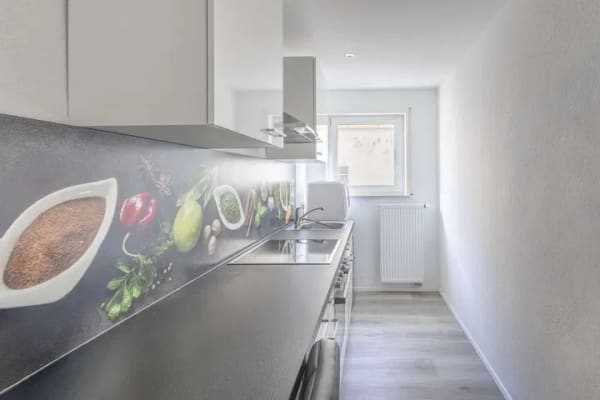 Immobilie in Landau in der Pfalz - Attraktiv & saniert: 1-ZKB-ETW mit Einbauküche, Balkon & Garage - Bild 1