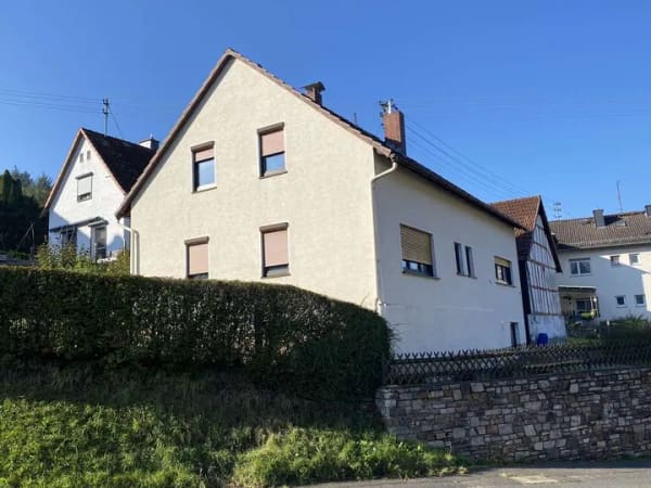 Immobilie in Hünstetten - Vermietetes Wohnhaus in ruhiger Taunus-Lage – solide Kapitalanlage Fakt. 12.5 nahe A3 & Bahn - Bild 0