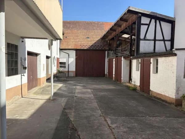 Immobilie in Bellheim - Einfamilienhaus mit Einliegerwohnung im ehemaligen landwirtschaftlichen Betrieb - Bild 1