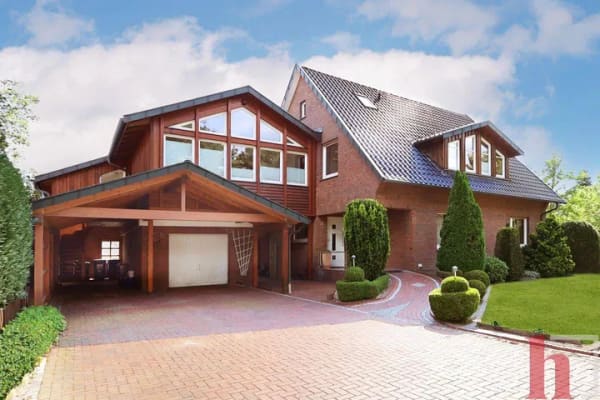 Immobilie in Neuenkirchen-Vörden - Großzügiges Zweifamilienhaus mit Wintergarten, Sauna & charmantem Garten - Bild 0