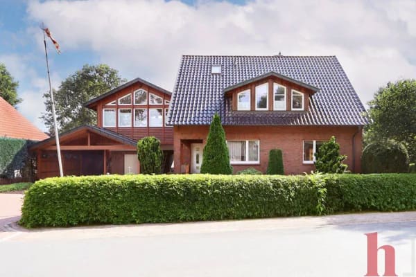 Immobilie in Neuenkirchen-Vörden - Großzügiges Zweifamilienhaus mit Wintergarten, Sauna & charmantem Garten - Bild 2