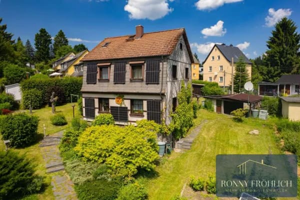 Immobilie in Stollberg/Erzgebirge - Freistehendes Einfamilienhaus mit großem Grundstück & viel Gestaltungspotenzial in Stollberg/Erzgeb. - Bild 0