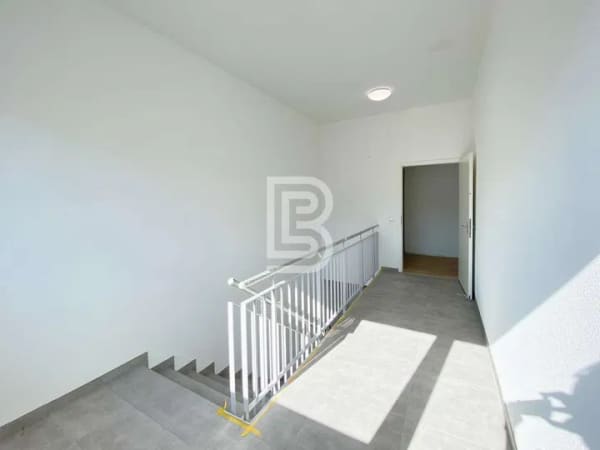 Immobilie in Merzhausen - Erstbezug im Attikageschoss - Großzügiges Wohnen mit viel Licht und schönem Ausblick - Bild 2