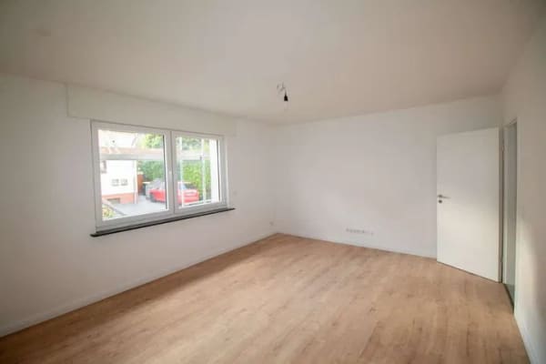 Immobilie in Kettig - Moderne Erdgeschosswohnung im Herzen von Kettig - Erstbezug mit Balkon und Garage! - Bild 1