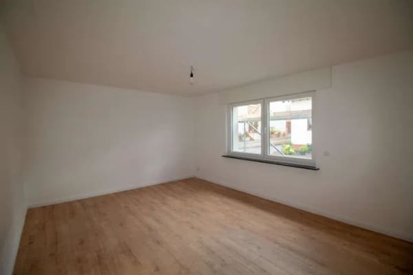 Immobilie in Kettig - Moderne Erdgeschosswohnung im Herzen von Kettig - Erstbezug mit Balkon und Garage! - Bild 2