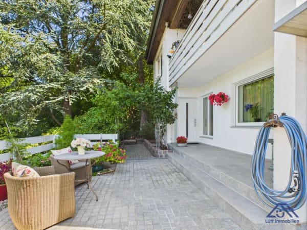Immobilie in Flintbek - Einfamilienhaus saniert zum Kauf in 24220 Flintbek | Lütt Immobilien Kiel | Provisionsfrei für Kaufende - Bild 1