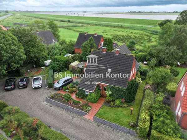 Immobilie in Moormerland - Gandersum! Gepflegtes Einfamilienhaus mit Garage und Gartenanlage in idyllischer Lage! - Bild 1