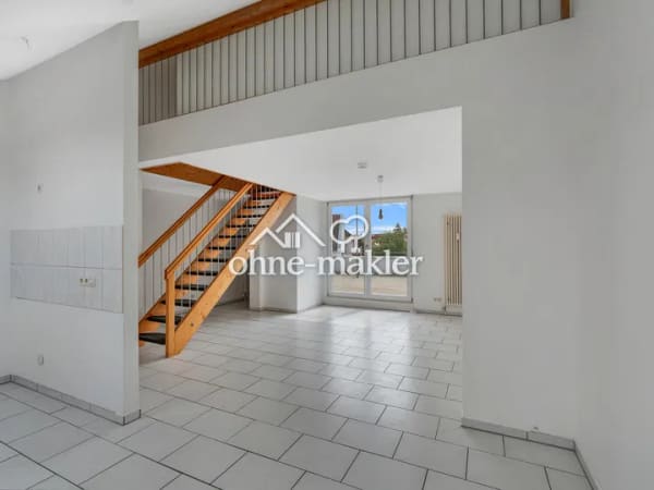 Immobilie in Gottmadingen - Großzügige Maisonettewohnung mit großer Dachterrasse und Tiefgaragenstellplatz in Gottmandingen - Bild 2