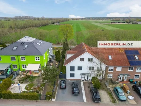 Immobilie in Velten - IMMOBERLIN.DE - Sehr freundliches Reihenendhaus mit Sonnenterrasse und 2 Pkw-Stellplätzen - Bild 0