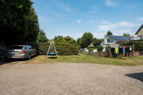 Immobilie in Schenefeld - Mehrfamilienhaus mit 4 vermieteten Wohnungen, 4 Garagen und großzügigem Gartengrundstück - Bild 3