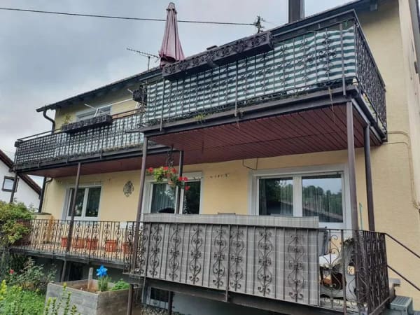 Immobilie in Sonnenbühl - Mehrfamilienhaus mit Werkstatt und Bauplatz in Erpfingen - Bild 1