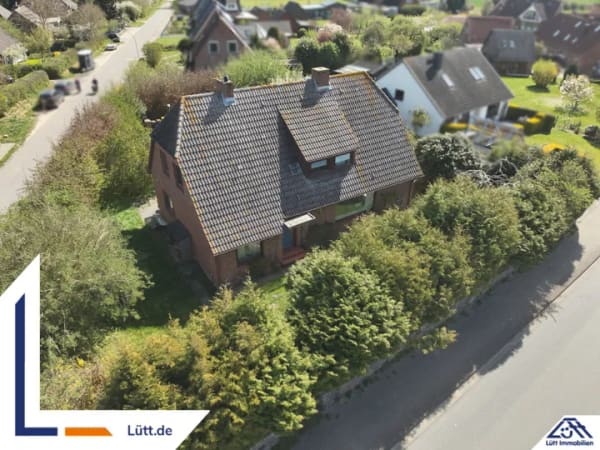 Immobilie in Behrensdorf - Einfamilienhaus mit ELW in 24321 Behrensdorf | Lütt Immobilien Kiel | Provisionsfrei für Kaufende - Bild 0