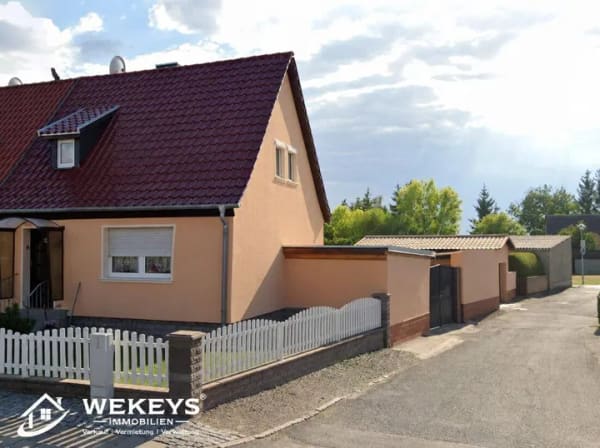 Immobilie in Kölleda - Kompaktes Einfamilienhaus mit Garten, Keller und Garagen in Kölleda - Bild 1