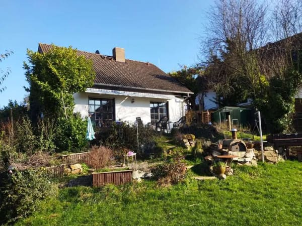 Immobilie in Dorsheim - Idyllisches Einfamilienhaus mit Traumgarten und ELW plus TechnikUpdates! - Bild 1