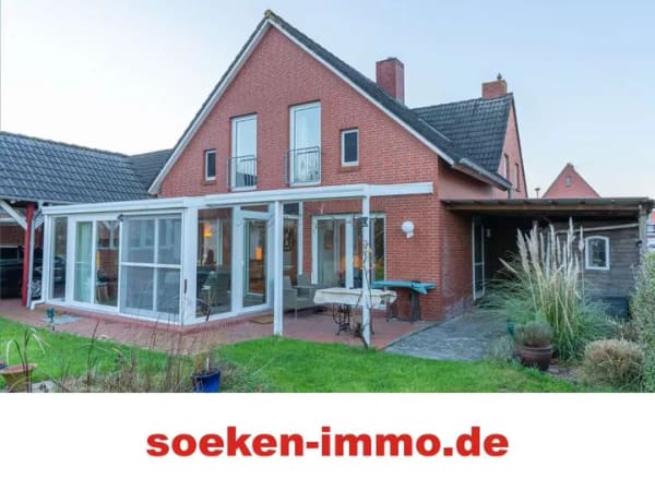 Immobilie in Moormerland - Charmantes Einfamilienhaus mit Wintergarten, Kamin und herrlichem Gartenparadies *HF2515a* - Bild 0