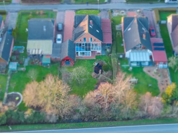 Immobilie in Moormerland - Charmantes Einfamilienhaus mit Wintergarten, Kamin und herrlichem Gartenparadies *HF2515a* - Bild 2