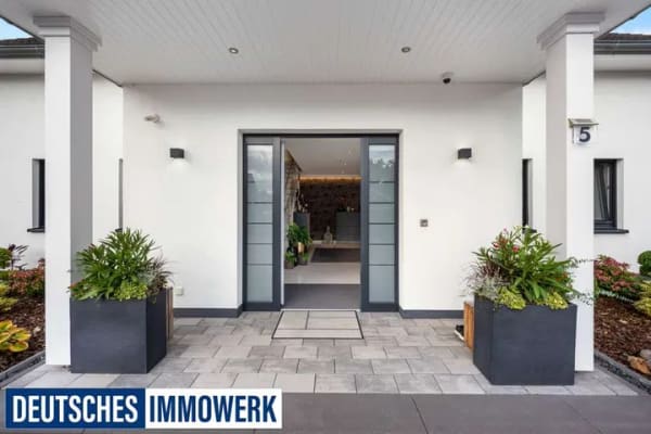 Immobilie in Kröppelshagen-Fahrendorf - Neuwertiges und großzügiges Einfamilienhaus mit A+ Energieeffizienz, Pool und Sauna am Sachsenwald! - Bild 4