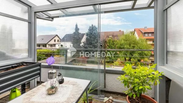 Immobilie in Kraichtal - Gemütlich über den Dächern: 92 m² DG-Wohnung mit Wintergarten & Kamin - Bild 1