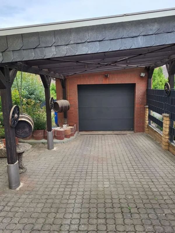 Immobilie in Wölfersheim - Charmantes Einfamilienhaus mit Terrasse mit Garage, Carport, Terrasse, Balkon und Wintergarten - Bild 1