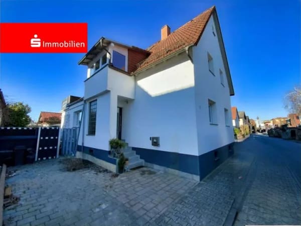 Immobilie in Biblis - Freistehendes Einfamilienhaus mit Garage in ruhiger Wohnlage - Bild 0