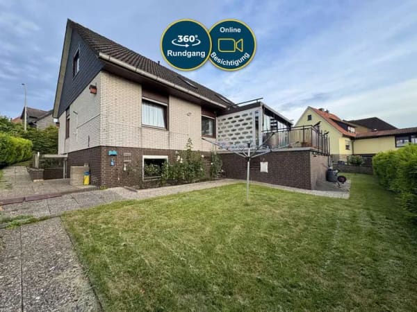 Immobilie in Obernkirchen - Zweifamilienhaus mit Weitblick – 2 Garagen – Wintergarten – Balkon – Unterkellert - Bild 0