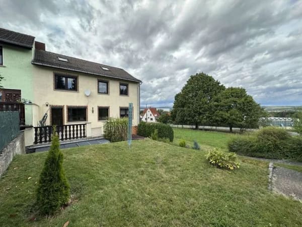 Immobilie in Werra-Suhl-Tal - Vitales Einfamilienhaus mit Doppelgarage, Terrasse & Garten - Bild 2