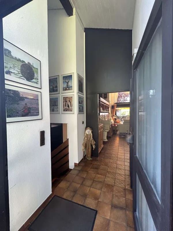 Immobilie in Klein-Winternheim - Ein Haus mit Charakter – außergewöhnliche Split-Level-Architektur mit Einliegerwohnung - Bild 2
