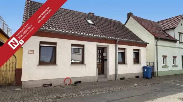 Immobilie in Martinshöhe - Teilrenoviertes Reihenmittelhaus - 85 m² voller Möglichkeiten - Bild 0