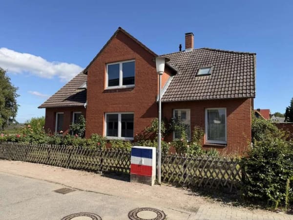 Immobilie in Heikendorf - Sanierungsbedürftiges Mehrfamilienhaus mit zusätzlichem Bauplatz für Ihr Traumhaus - Bild 1
