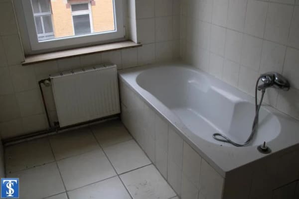 Immobilie in Falkenstein/Vogtland - Objekt-Nr.: 64/19 - Teilsaniertes Wohn- und Geschäftshaus mit 1 GE und 4 WE in Falkenstein - Bild 2