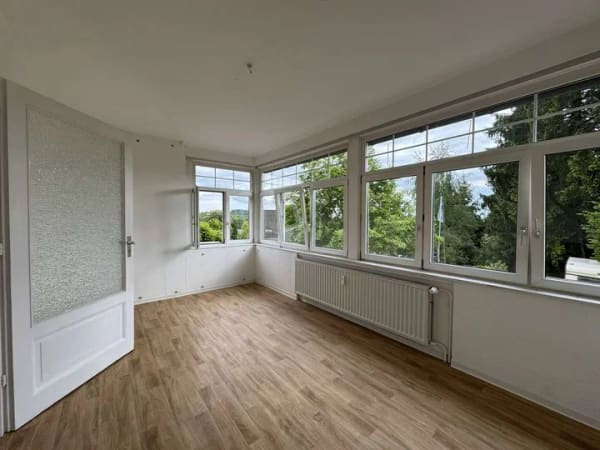 Immobilie in Bad Sachsa - Bad Sachsa: 9,25 % Rendite: 6-Parteienhaus mit 2 Garagen und 2 Carportstellplätzen - Bild 1