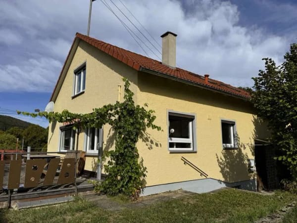 Immobilie in Münsingen - Gepflegtes Einfamilienhaus mit sonniger Terrasse in ruhiger Wohngegend - Bild 1