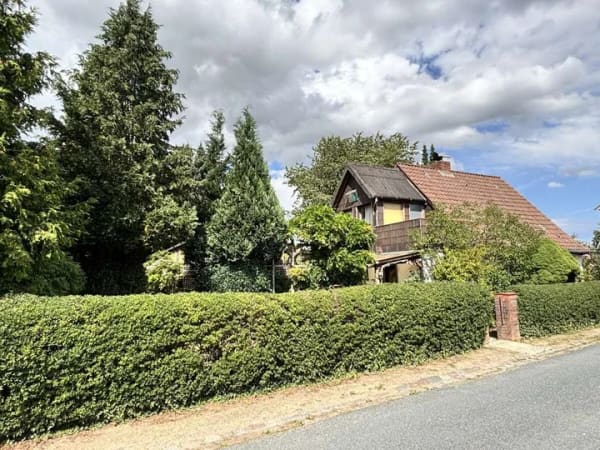 Immobilie in Delingsdorf - Sanierungsbedürftiges Einfamilienhaus mit viel Potenzial in ruhiger Wohnlage - Bild 1