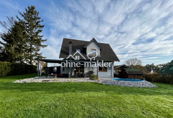 Immobilie in Ückeritz - Einfamilienhaus mit Pool, Carport + Ferienhaus + Baugrundstück - Bild 0