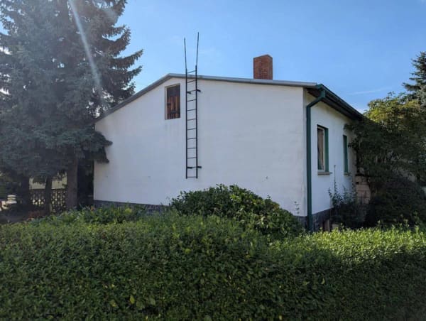 Immobilie in Oranienbaum-Wörlitz - Massives Einfamilienhaus mit großem Holzblockhaus in ruhiger Lage - Bild 2