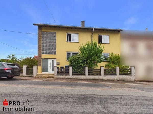 Immobilie in Heusweiler - Vielseitiges Zweifamilienhaus in Heusweiler-Holz - Bild 0