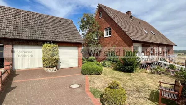 Immobilie in Wallenhorst - Einzigartiger Ausblick, 1.118 m² großes Grundstück - Bild 1