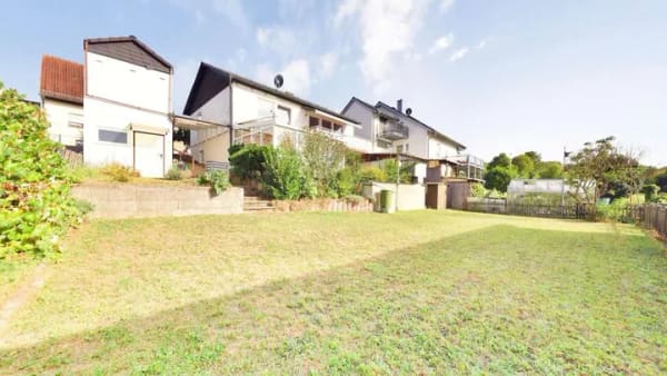 Immobilie in Üchtelhausen - Familienglück mit Weitblick und sonnigem Westbalkon - Bild 3