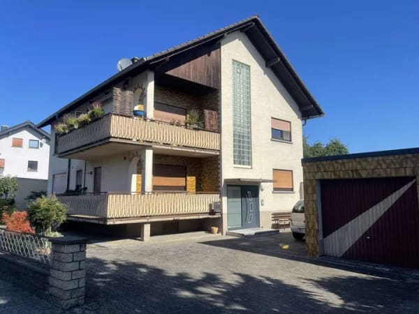 Immobilie in Steinmauern - Zweifamilienhaus mit einer vermieteten Wohnung und Garten - nach WEG geteilt - Bild 3