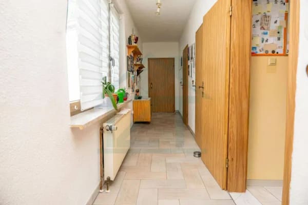 Immobilie in Miesitz - Wohnen auf einer Ebene! Haupthaus mit Wintergarten, 3 Garagen & riesiges Grundstück - Bild 4