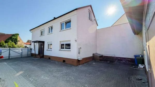 Immobilie in Forst - Wohnen mit Potenzial: Einfamilienhaus mit ausbaufähiger Scheune und Garten - Bild 2