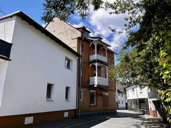 Immobilie in Schmitten - Mehrfamilienhaus in Schmitten – 4 Einheiten, solide Mieteinnahmen, gepflegter Zustand - Bild 1
